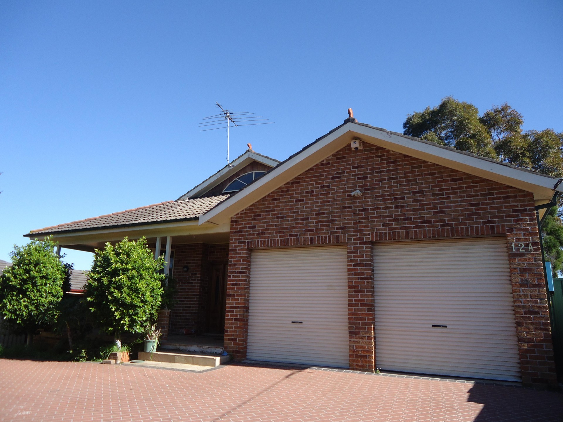 Fully Tiled Throughout & Double Garage