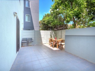 View profile: Stunning Unit with massive wrap around courtyard!