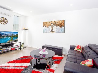 View profile: Stunning Unit with massive wrap around courtyard!